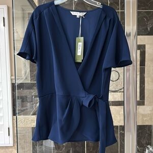 Trina Turk blue top, size M, NWT.